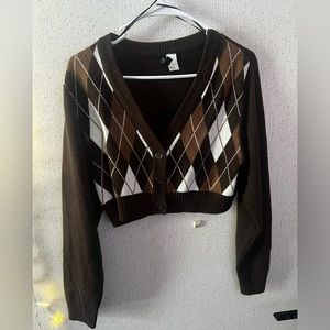 This is a multi brown v neck sweater only worn a few times. It is a size small